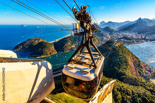 Canvas Print Sugar Loaf Mountain Cable Car Overlooking Christ The Redeemer Statue in Corcovad