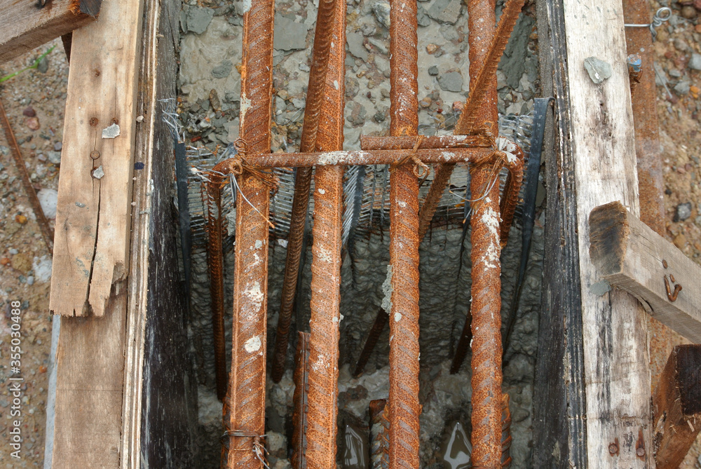 Φωτογραφία Hot-rolled deformed steel bars or steel reinforcement bar tied together before casting in the concrete