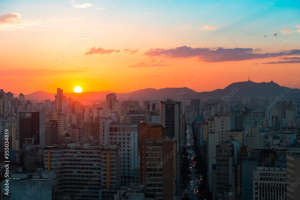 São Paulo City Downtown Skyline During a Golden Sunset Over The Mountains, Brazil