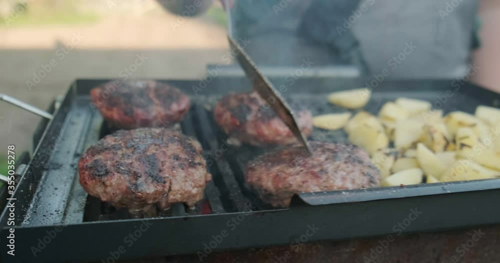 Juicy Meat Cutlet Flowing, Cooking Pork Cutlet for Eating, Ready Steak, Tasty Lunch, Cooking in the Nature, Cook Checks Food, Gentle Chops Prepared, Can Serve to People, Restaurant on street, Grilling Juicy Meat Cutlet Flowing, Cooking Pork Cutlet for Eating, Ready Steak, Tasty Lunch, Cooking in the Nature, Cook Checks Food, Gentle Chops Prepared, Can Serve to People, Restaurant on street, Grilling