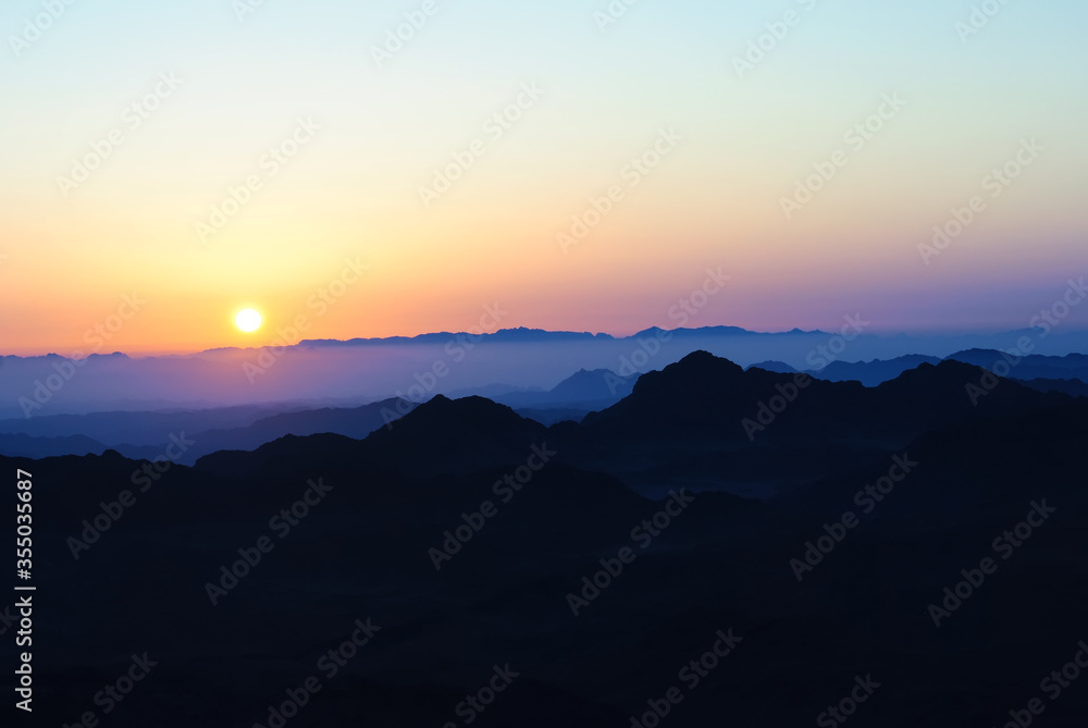 Fototapeta premium Sunset in the mountains. Landscape with sunrise. Colorful gradient.