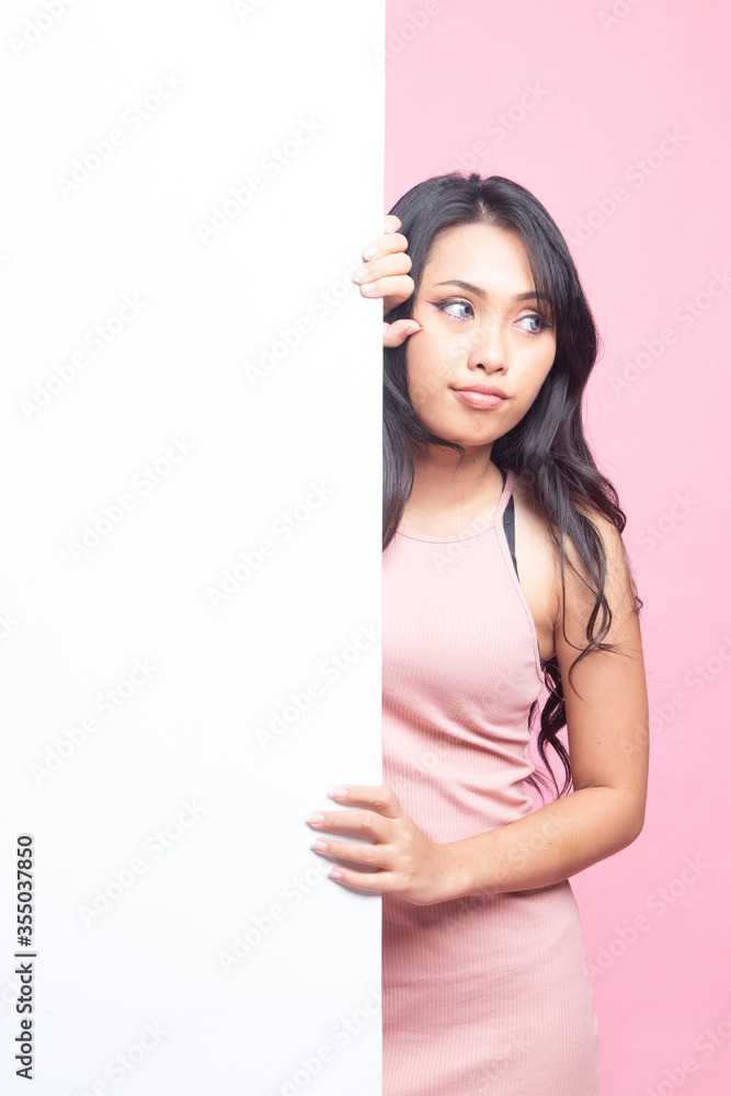 Young Asian woman with blank sign. Young Asian woman with blank sign.