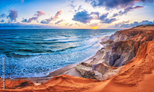 Famous and Touristic Sand Cliffs In Morro Branco Beach (Falésias de Morro Branco), Beberibe, Ceará State, Northeast of Brazil photo