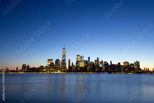 New York  NY   United States - Feb. 8  2010  Wide angle landscape image of the lower Manhattan skyline at sunrise during the winter.