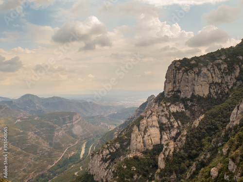Montserrat, Barcelona / Spain - Sept. 8, 2016: The dramatic mountain of Montserrat, famous for its wind-sculpted rock formations and Benedictine abbey, © Brian