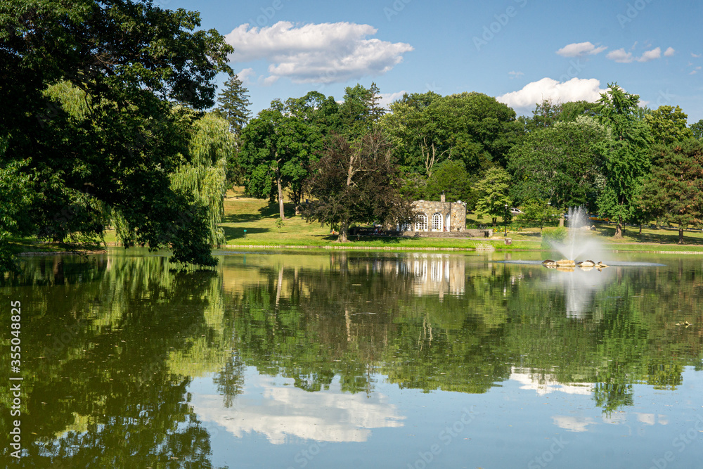 Newburgh, NY / United States - July 14, 2019:  a view of the Poly and the Shelter House at Downing Park; a city park was designed in the late 19th century by Frederick Law Olmsted and Calvert Vaux