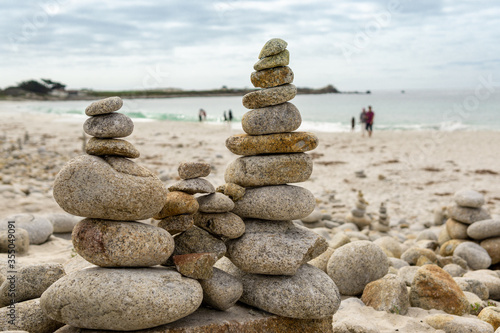 Pacific Grove, CA / United States - Aug. 19th, 2019: Landscape view of Cairns on the beach at Spanish Bay alone the 17-mile Drive,