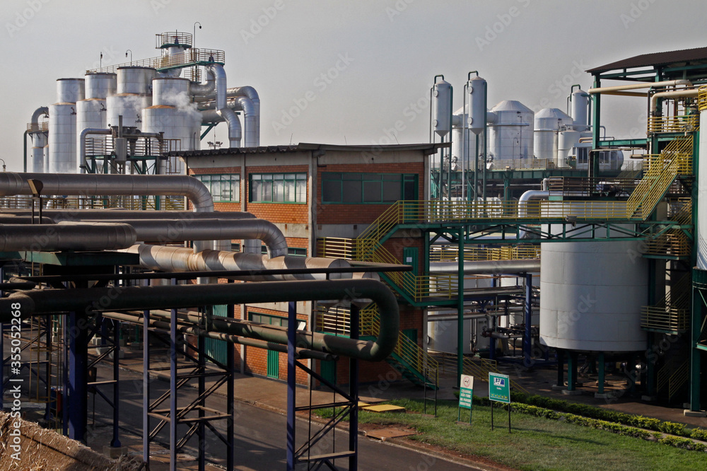 Naklejka premium sugar cane and ethanol plant