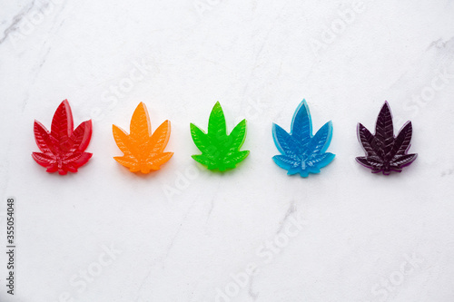Homemade cannabis infused rainbow gummy candy edibles. photo