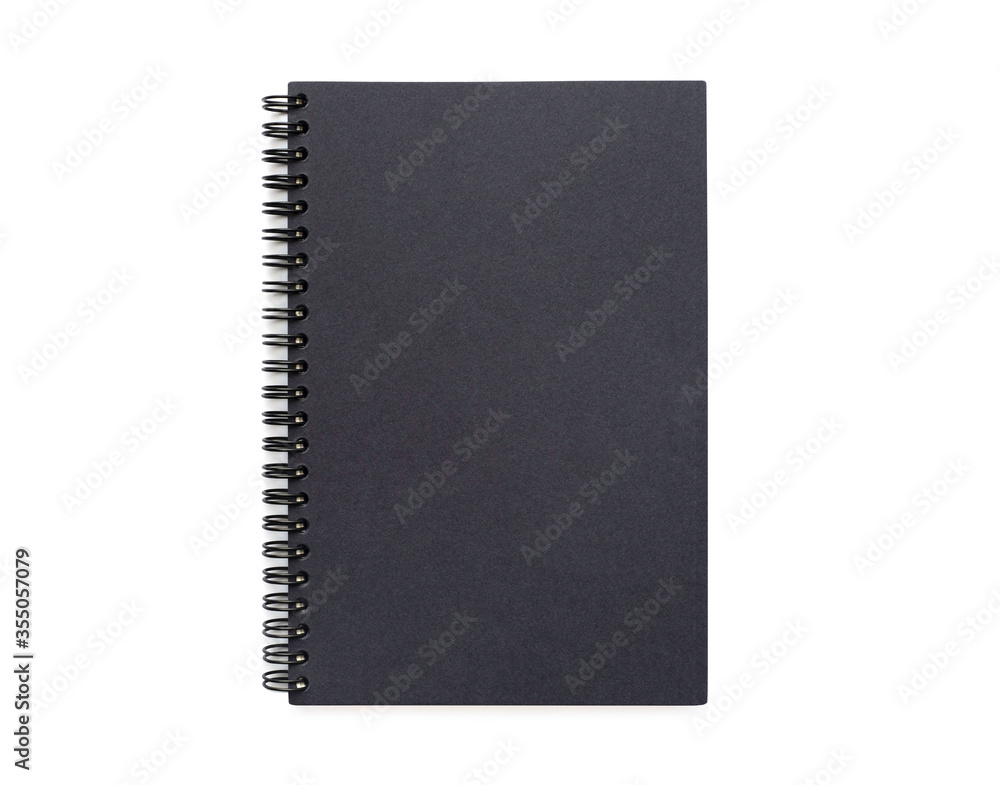 Top view above of Black closed spiral blank craft paper cover notebook isolated on white background for design a mockup. Education and business concept. flat lay