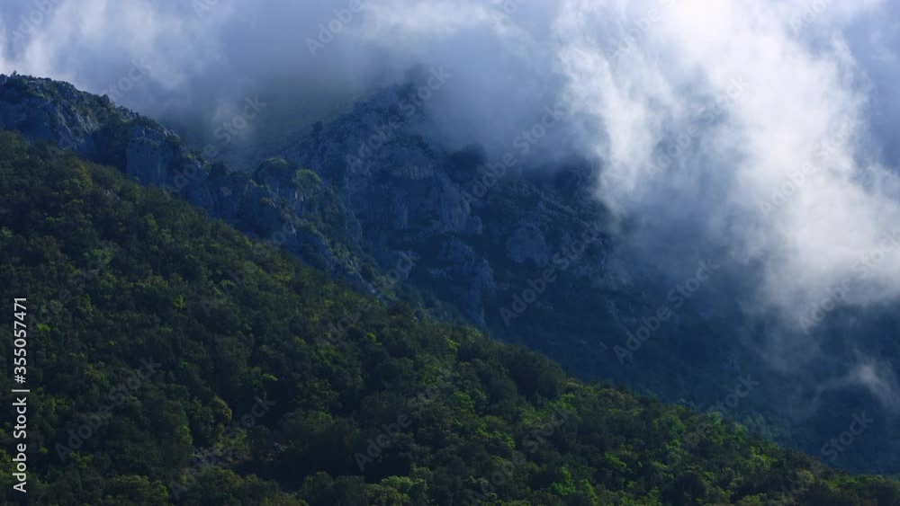 Time lapse of Mount Candina in the Liendo Valley in the Eastern Coastal Cordillera in the Autonomous Community of Cantabria by the Cantabrian Sea in northern Spain, Europe Time lapse of Mount Candina in the Liendo Valley in the Eastern Coastal Cordillera in the Autonomous Community of Cantabria by the Cantabrian Sea in northern Spain, Europe