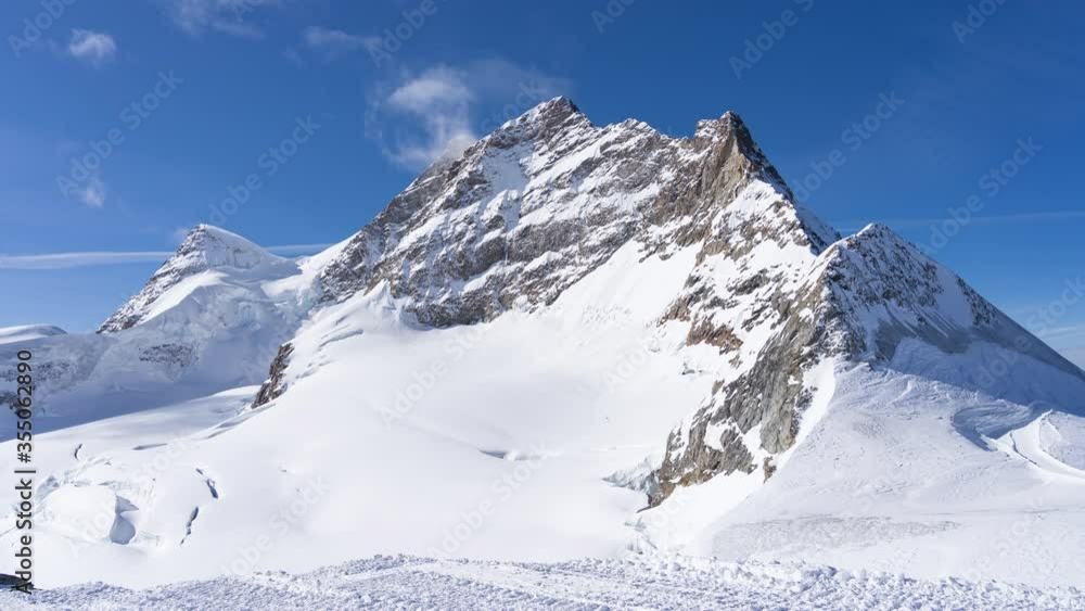 Time lapse of snow mountain at Jungfrau in Switzerland Time lapse of snow mountain at Jungfrau in Switzerland