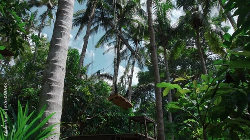 long nomads with man away at rice terass on bali island photo