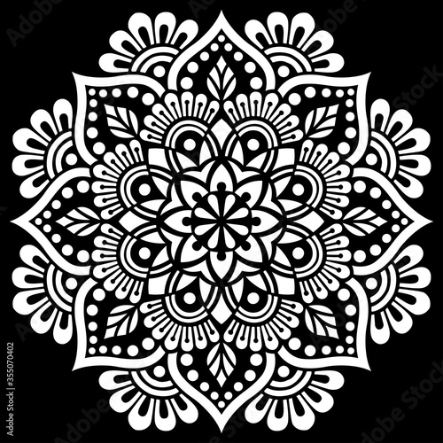 White mandala pattern on black stencil doodles sketch