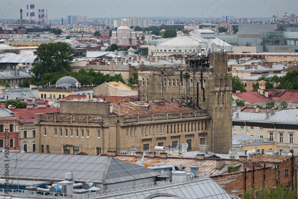 View on Saint Petersburgs' roofs from a cathedral height. Saint Petersburg in different directions.