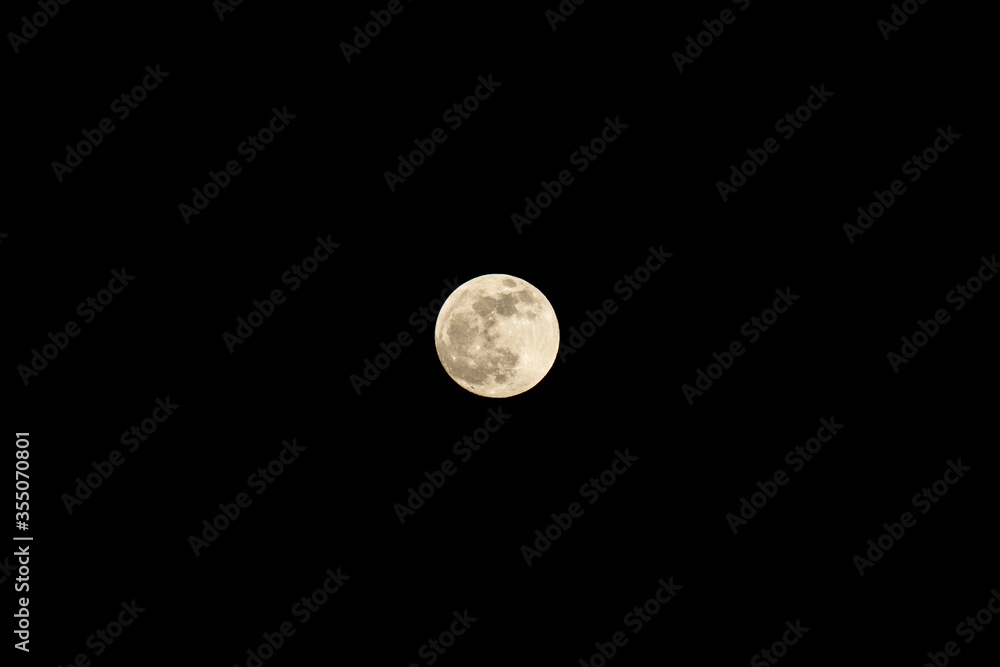 Fullmoon centered in the night sky Fullmoon centered in the night sky