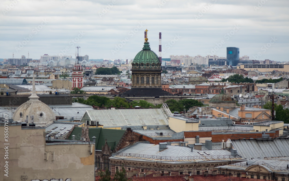 View on Saint Petersburgs' roofs from a cathedral height. Saint Petersburg in different directions. Kazan cathedral