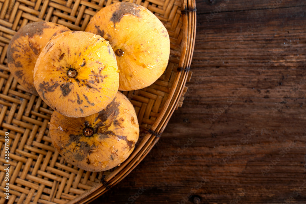 The fruit of the santol is laid on the table. The fruit of the santol is laid on the table.