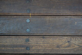Very old wood texture with metal rivets