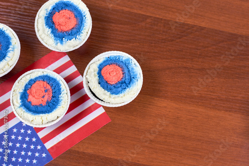 Celebrating Fourth of July. Happy Independence day. Sweets decorated in traditional colors and American national flag