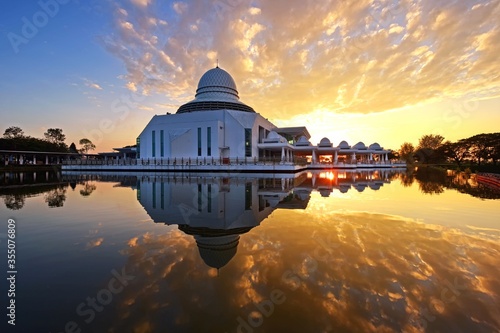 Beautiful sunrise reflections over the mosque in Perak, Malaysia