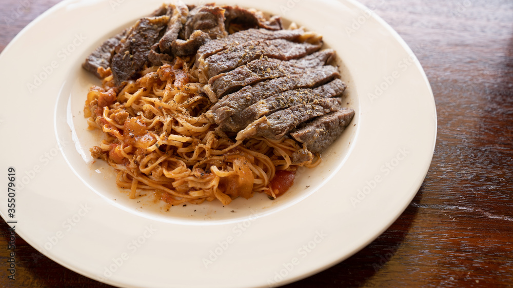 Pasta Steak Sauce in a White Plate Pasta Steak Sauce in a White Plate