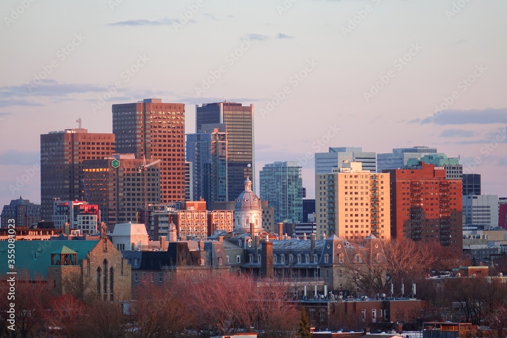 Close view of a few sky scrapers of Montreal's down town from a distance of Plateau district from high floor