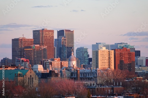 Close view of a few sky scrapers of Montreal s down town from a distance of Plateau district from high floor