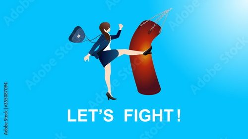 Woman kicking a punching bag