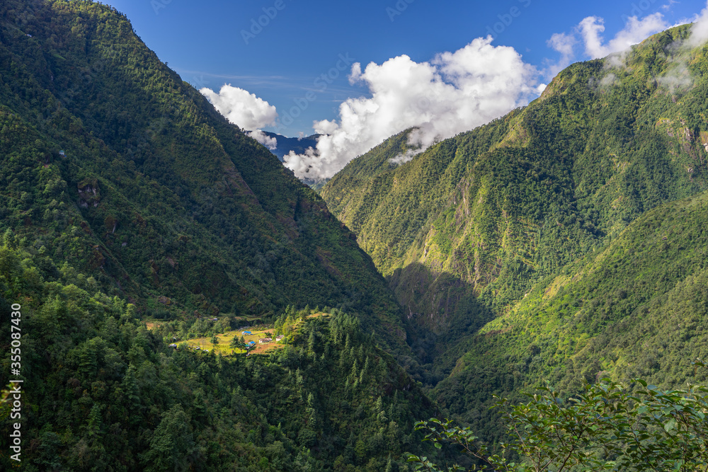 Naklejka premium Small village surrounded by Himalaya mountains range in Everest region, Nepal