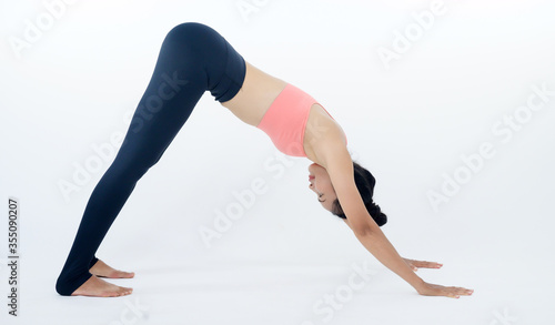 Asian women practicing yoga on a white background