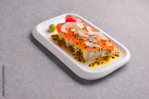 Fresh maki and nigiri sushi rolls with tuna fish and cheese. Asian Japanese cuisine concept.