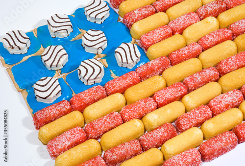 An American flag created from an assembly of snack cakes and other junk food.