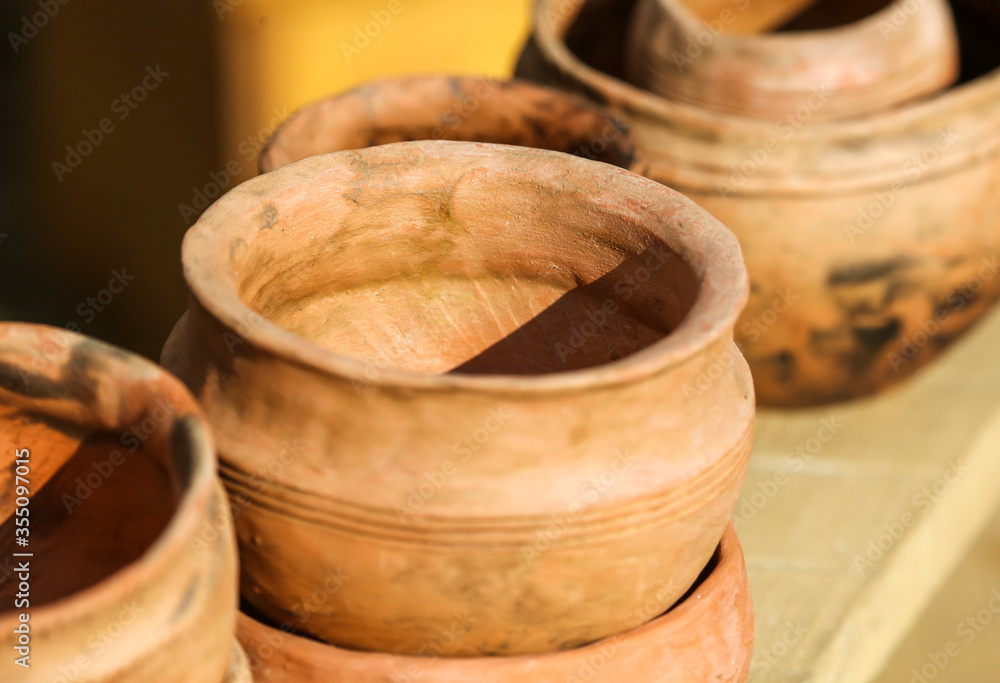 Fototapeta premium Clay dishes on a counter
