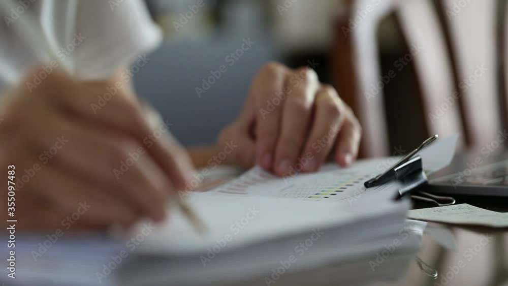 People hand with pen writing ondocument papers People hand with pen writing ondocument papers