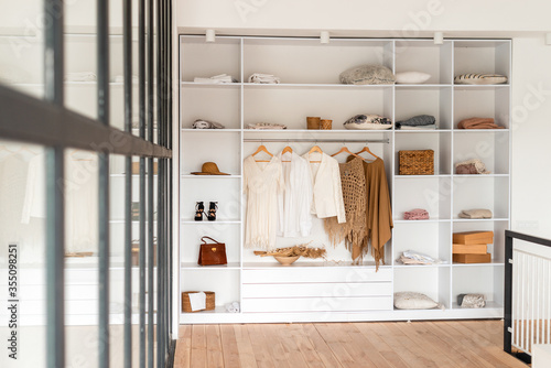 Fényképezés Modern interior, beautiful wardrobe with clothes
