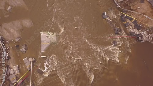Aerial shot of streaming flood after dam collapse, Wixom Lake, MI
