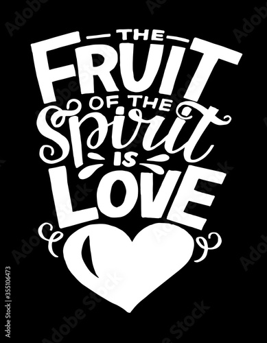 Hand lettering The Fruit of spirit is love on black background.