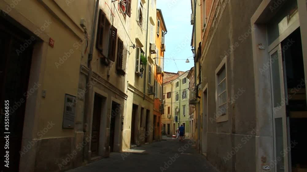 Narrow street of a town. Narrow street of a town.