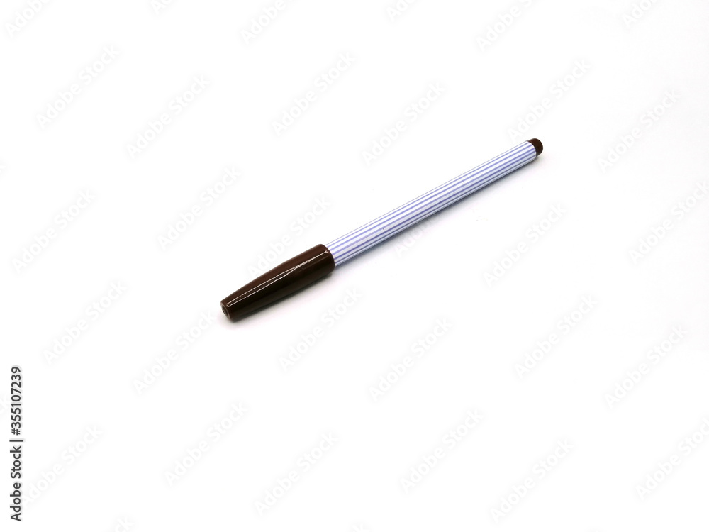 Brown color pen on white background Brown color pen on white background