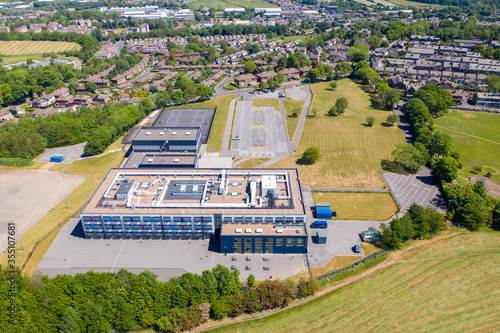 Aerial drone photo of the Whitcliffe Mount Primary School, showing an aerial photo of the British school building on a bright sunny summers day photo