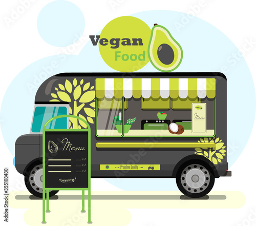 Street food truck with vegetarian food. Vector flat illustration of a vegan diner on wheels with a striped awning, an eco tree pattern on a van, and an advertising stand. Stylish retro illustration of