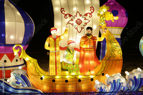 Chinese paper lantern in form of fairytale ship, sea. Night lights. Asian traditional national folk art. Oriental tradition. Symbol of China, asia and east. Ethnic decoration. Decor with lamp. Sadko photo