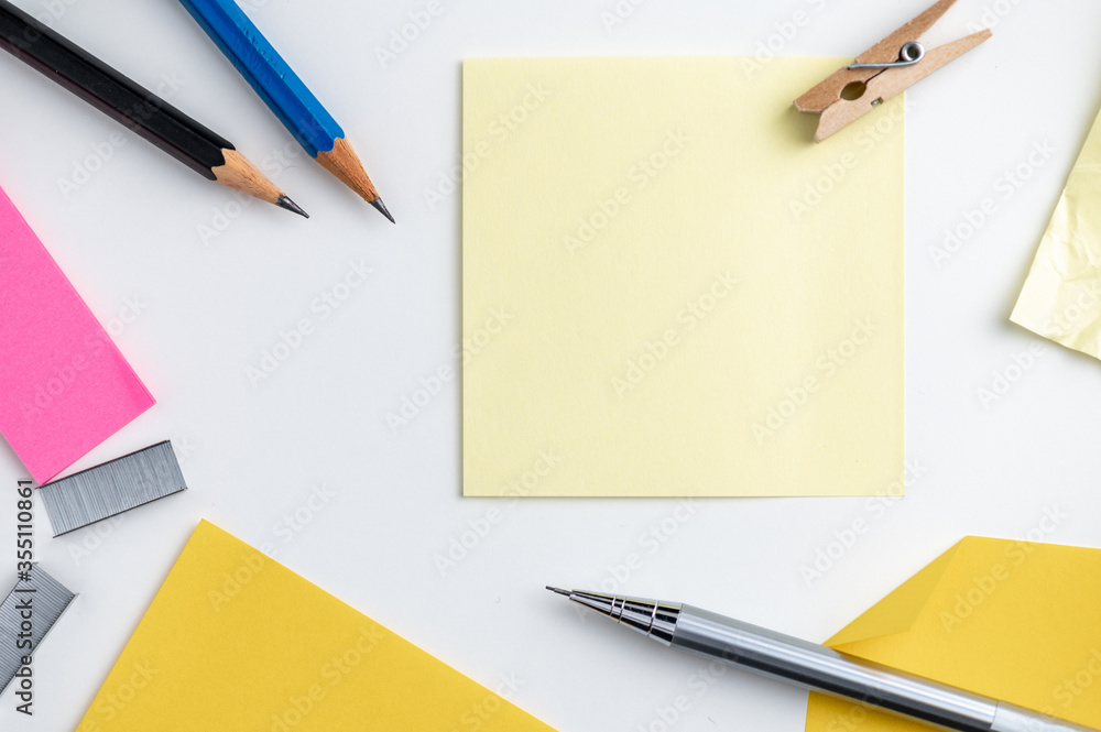 Office desk table pencil and post it on white background. Office desk table pencil and post it on white background.