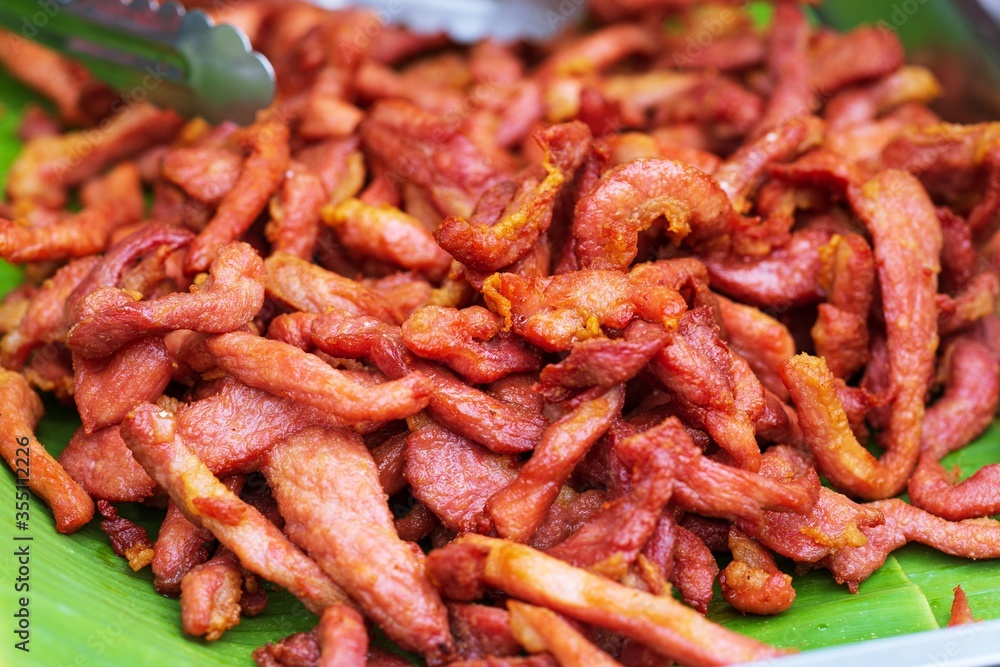 Close up of deep fried dried pork thai street food market