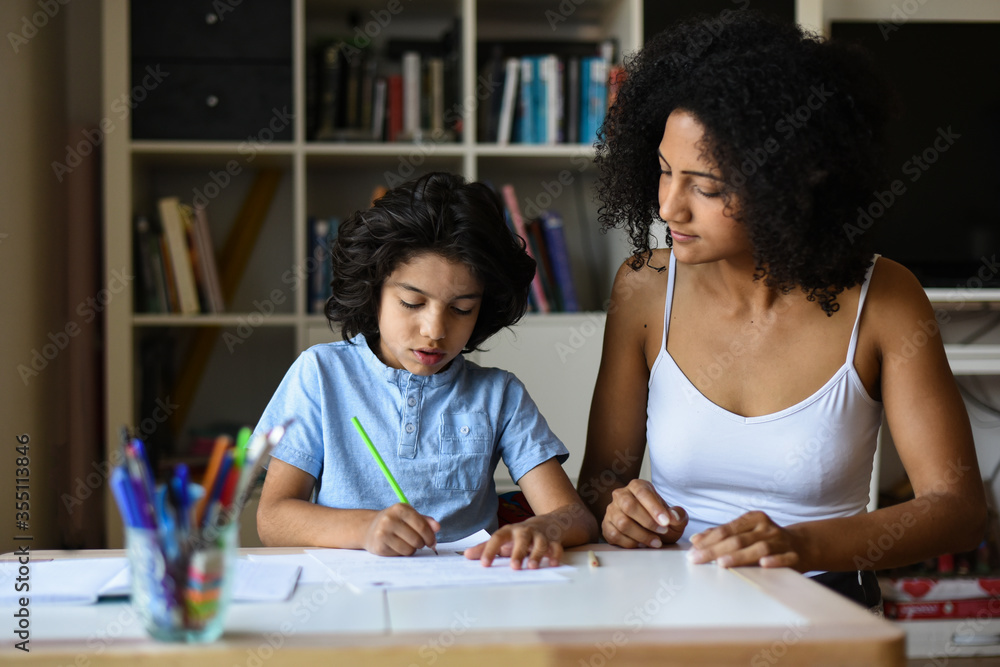 metis mother tutoring her son at home metis mother tutoring her son at home