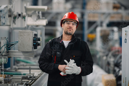 Portrait of worker in factory.

 photo