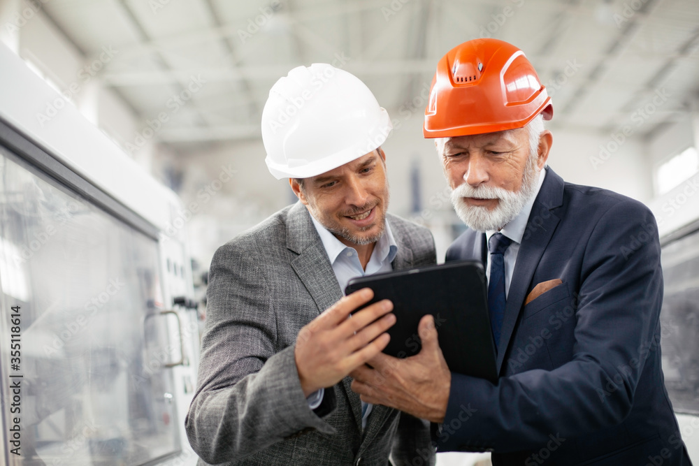 Colleagues working together. Arhitects in factory.
Colleagues working together. Arhitects in factory.