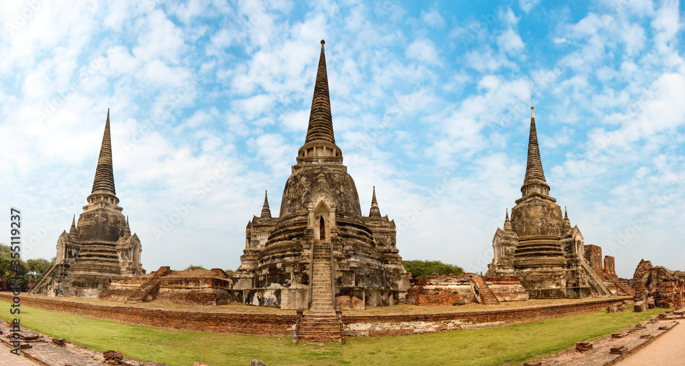 Panorama of temple ruins of old Siam capital Ayutthaya historical architecture of Thailand. View to three white chedies of Wat Pra Si Sanphe Panorama of temple ruins of old Siam capital Ayutthaya historical architecture of Thailand. View to three white chedies of Wat Pra Si Sanphe