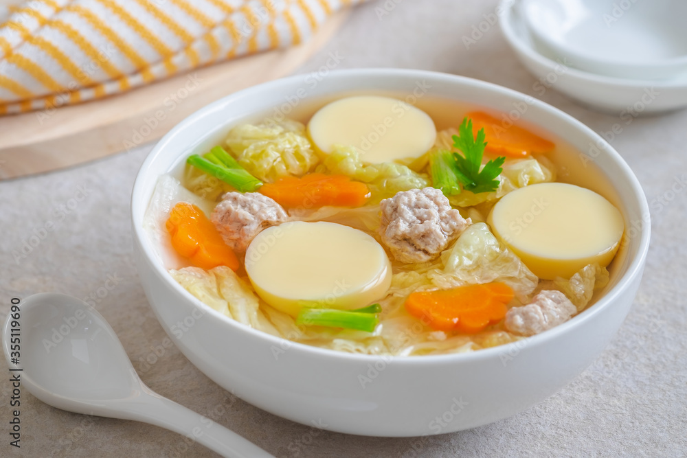 Clear soup with egg tofu and minced pork, Thai food. Clear soup with egg tofu and minced pork, Thai food.